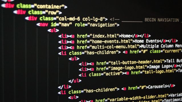 Cursor vs VS Code AI code editor comparison on screen